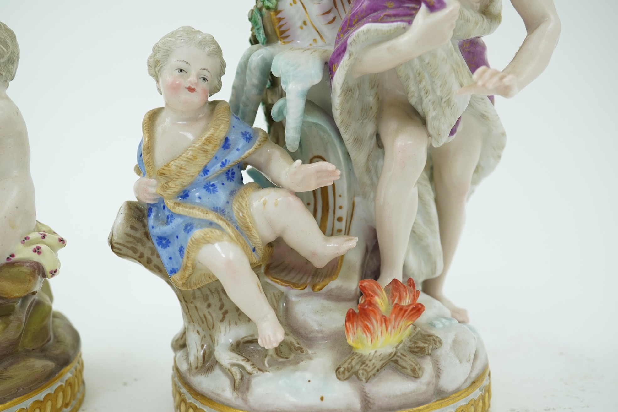 A near pair of Meissen figural candlesticks, late 19th century